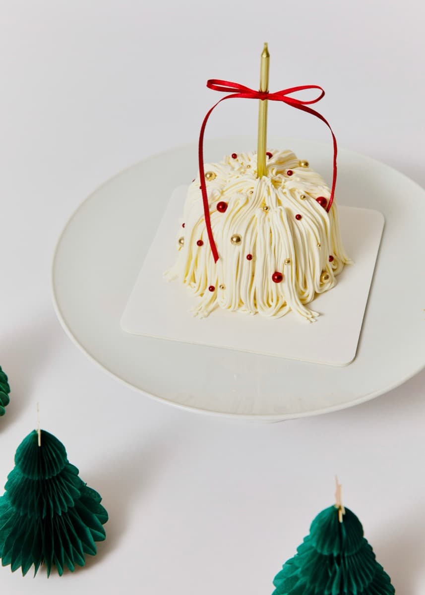 Christmas dome with red ribbon & gold sprinkles