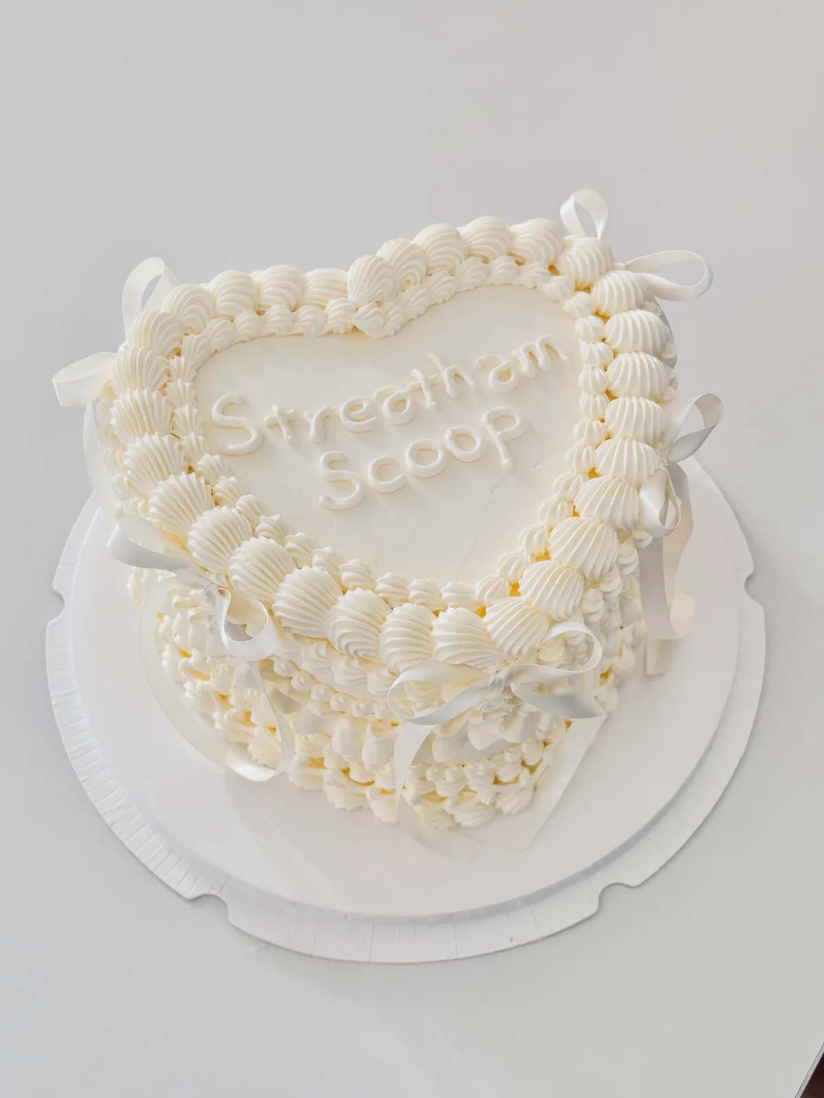 Ivory heart cake with piped lettering and pearl border, custom cake made in Streatham SW16 - Danine Cakes