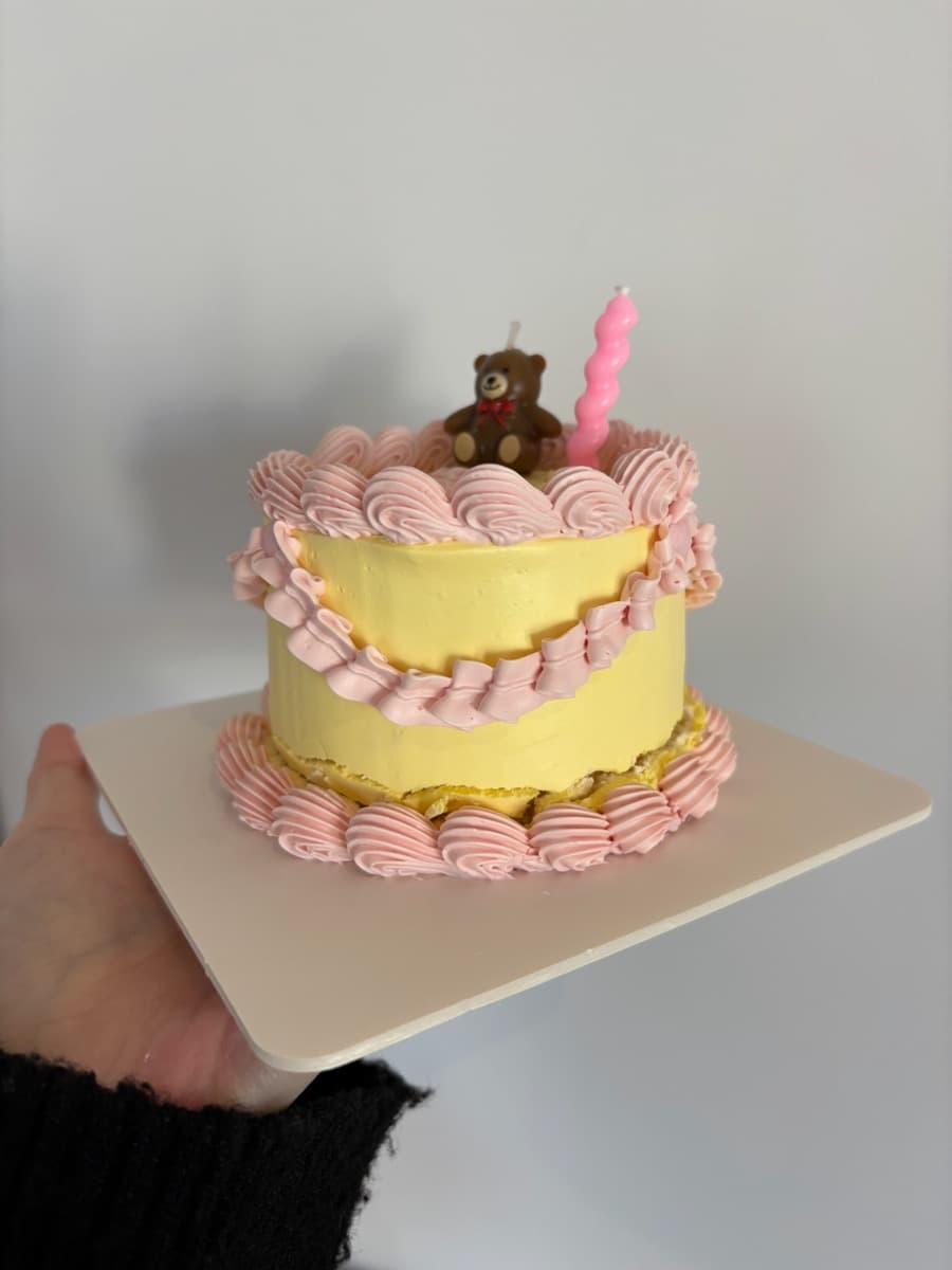Yellow & pink with a little teddy bear