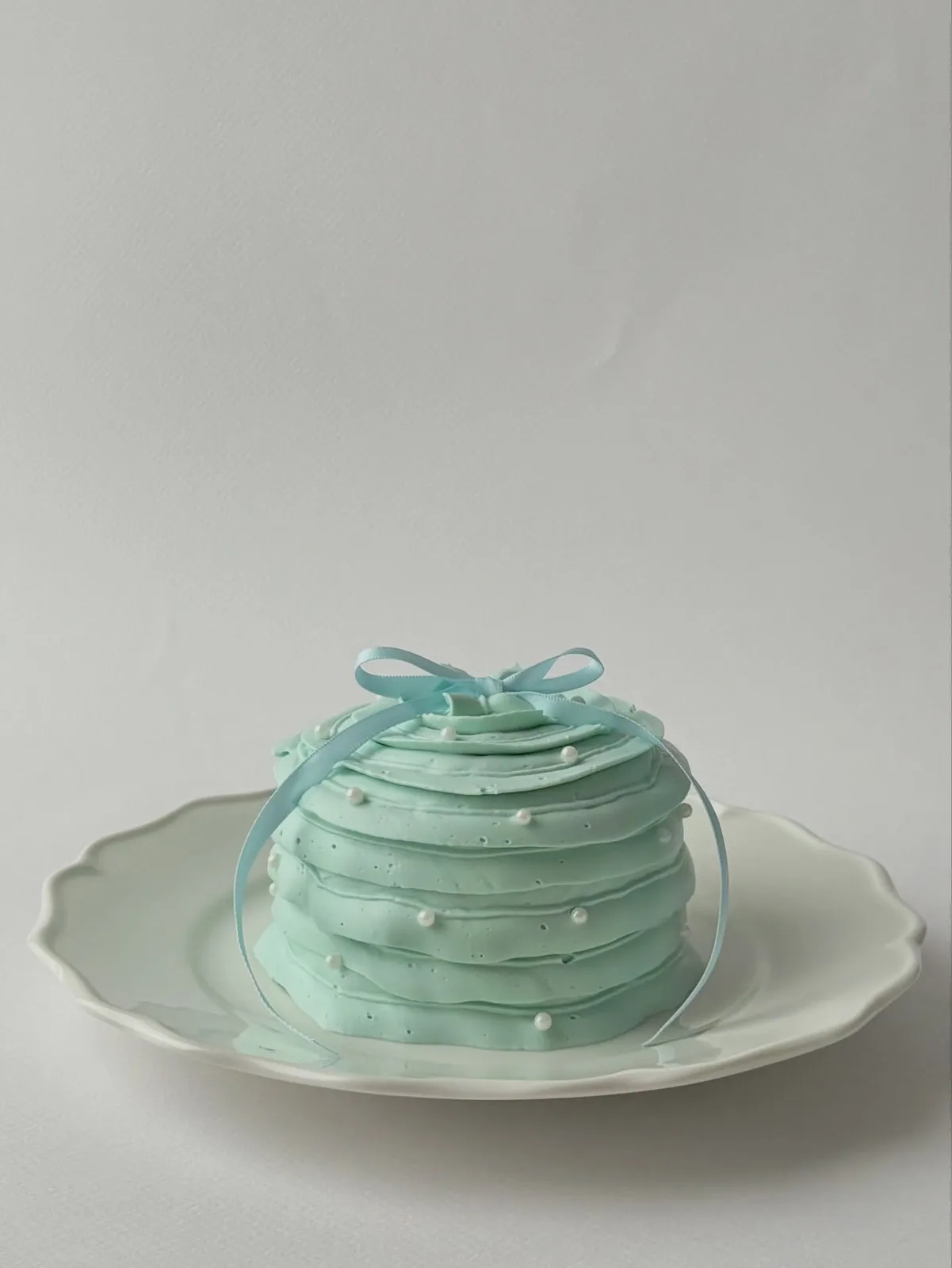 Mint piped ridged dome cake with bow, Korean-inspired custom cake handmade in Streatham, London