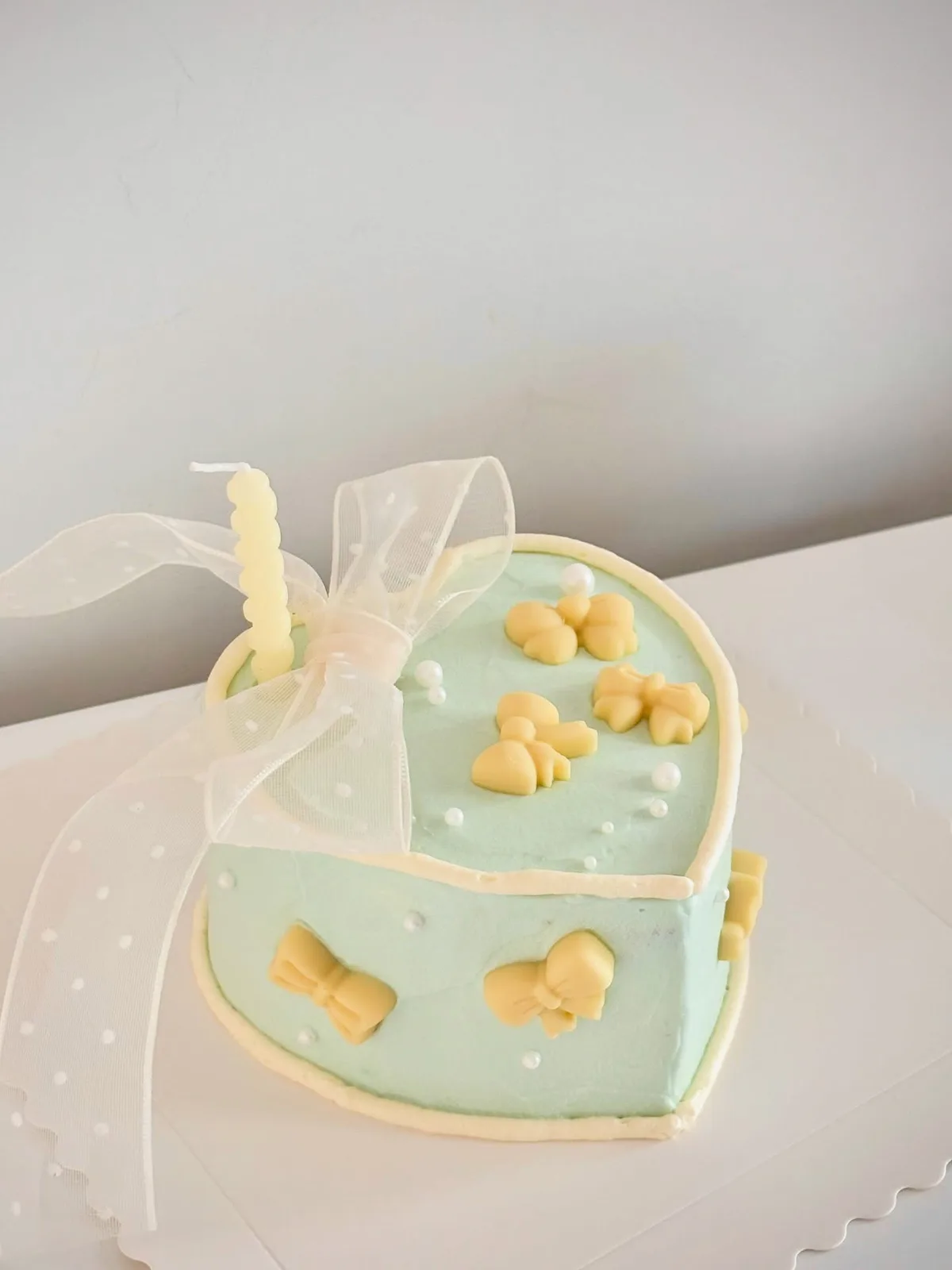 Pale blue heart cake with yellow hearts and tulle, Korean-inspired custom cake handmade in Streatham, London