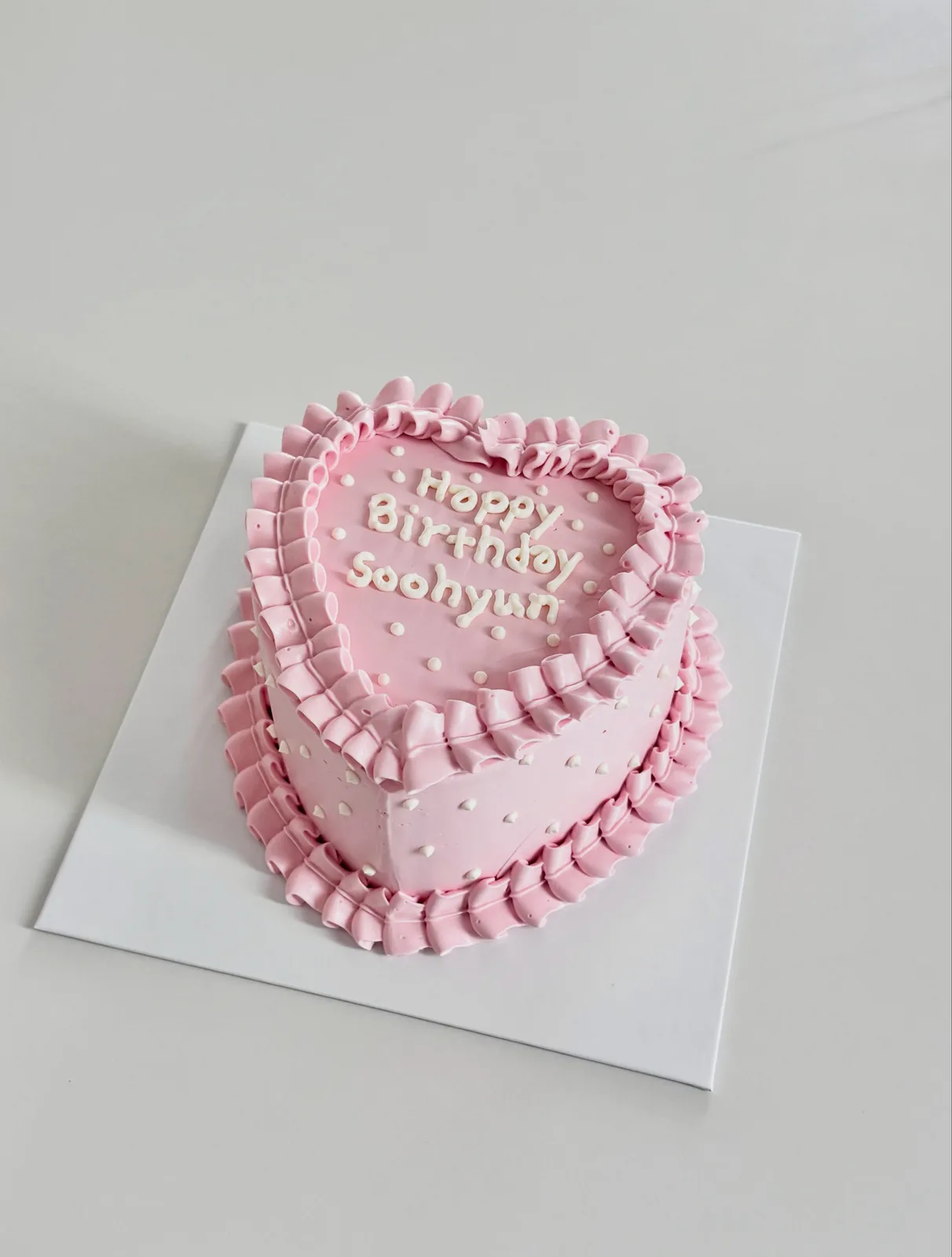 Pink heart cake with pearls and ruffle piping, Korean-inspired custom cake handmade in Streatham, London