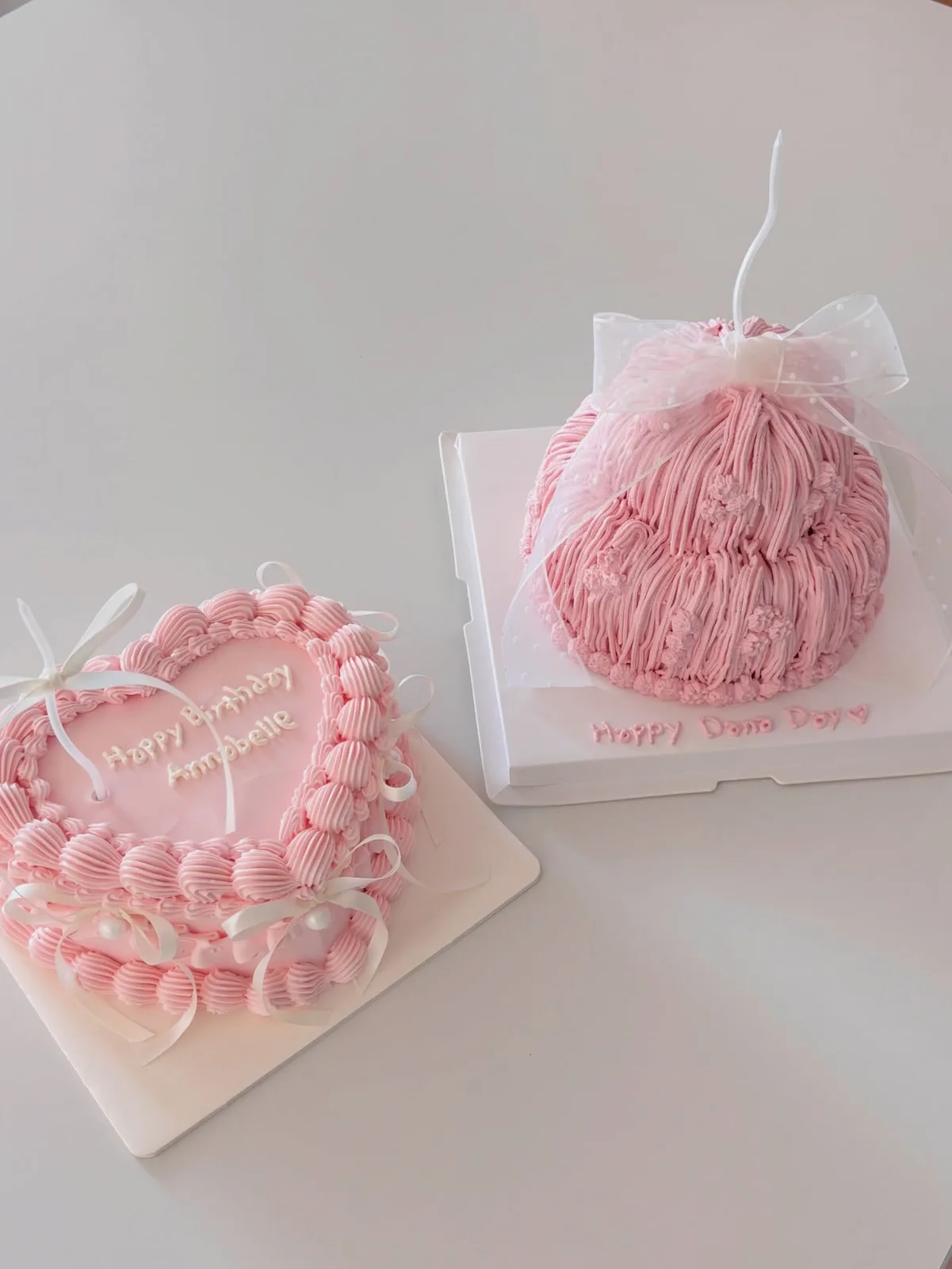 Pink piped dome cake with heart cake and lettering, handmade to order by Danine Cakes in Streatham, South London