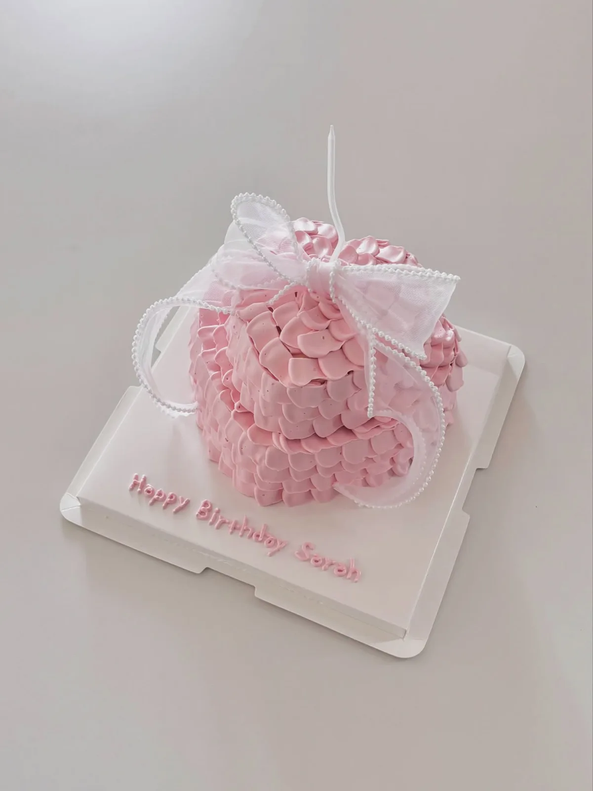 Pink piped ruffle cake with organza ribbon, Korean-inspired custom cake handmade in Streatham, London